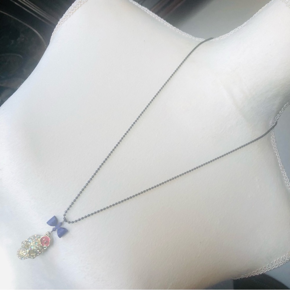 Aurora borealis hollow skull pendant on chain necklace